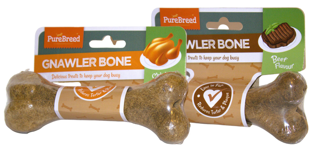 Two PureBreed Gnawler Bone dog treats on a white background
